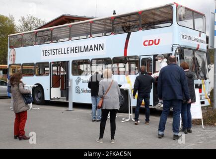 Berlin, Germany. 26th Apr, 2021. In cooperation with a pharmacy, Heilmann (CDU), a member of the Bundestag, has set up a bus as a test station in the district of Steglitz-Zehlendorf. Credit: Wolfgang Kumm/dpa/Alamy Live News Stock Photo