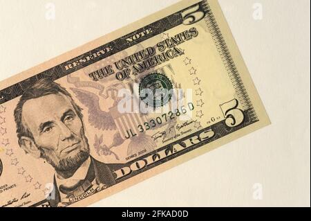 Mumbai India Asia April 22 2021 American five dollar portrait of Abraham Lincoln was an American statesman and lawyer Stock Photo