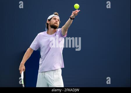 Miami Gardens, Florida, USA. 24th Mar, 2021. Pedro Sousa of Portugal serves the ball during his loss to Pierre-Hugues Herbert of France in the first round of the Miami Open on March 24, 2021 on the grounds of Hard Rock Stadium in Miami Gardens, Florida. Mike Lawrence/CSM/Alamy Live News Stock Photo