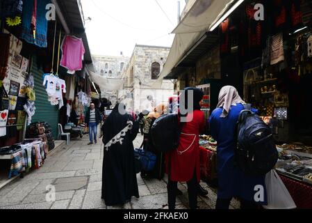 Palestinian women at Al-Wad street in the Muslim quarter in the old city of Jerusalem. Stock Photo