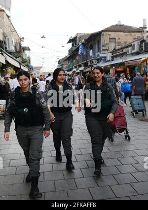 Israeli Border Police soldiers patrolling the Mahane Yehuda market in Jerusalem, Israel. Stock Photo