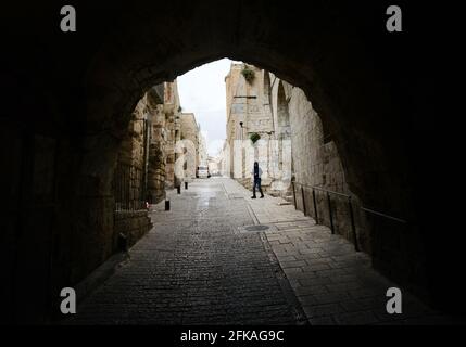 Walking on the Lions Gate street in the old city of Jerusalem. Stock Photo