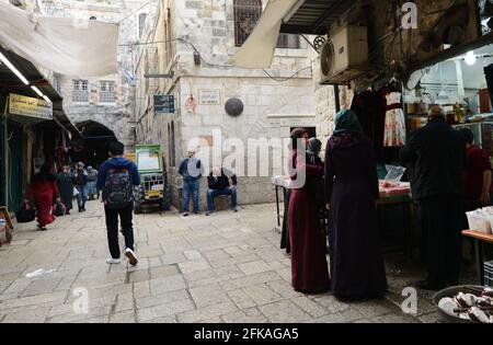 Palestinian women at Al-Wad street in the Muslim quarter in the old city of Jerusalem. Stock Photo