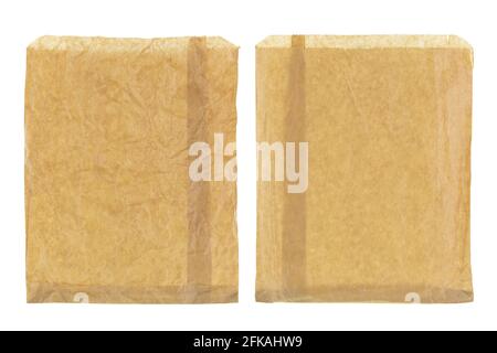 Closeup of wrinkly thin brown grocery paper bag, blank front and back isolated on white background Stock Photo