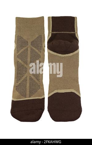 Thick wicking socks in brown color. Comfortable hiking soft socks isolated on white background. Stock Photo