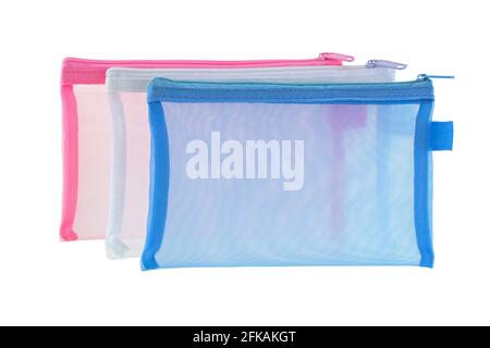 Transparent clear net bags in blue white pink ideally used as cosmetic bag, stationery pencil case, document file isolated on white background Stock Photo