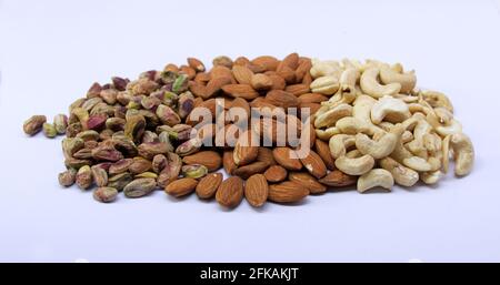 Mixed of almonds seeds nut on white background. Stock Photo