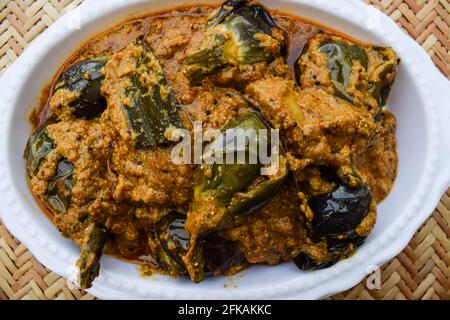 Delicious Indian brinjal curry specially made in south india known as Gutti Vankaya an Andhra party style side dish with peanut,sesame gravy. Eggplant Stock Photo