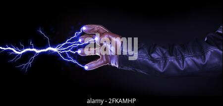 Hand shooting out a bolt of lightning - Dark and mysterious, isolated on black Stock Photo