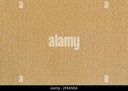 Closeup detailed texture of new and clean floor rug, doormat in beige color Stock Photo