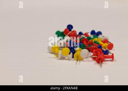 a pile of colorful push pins with white background Stock Photo