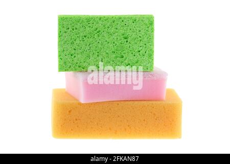 Stack of clean super absorbent cellulose sponge, dish washing sponge with scrub and multi purpose sponge isolated on white background Stock Photo