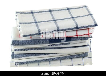 Folded kitchen towels in different patterns, isolated on white Stock Photo