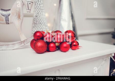 red Christmas balls are on the shelf Stock Photo