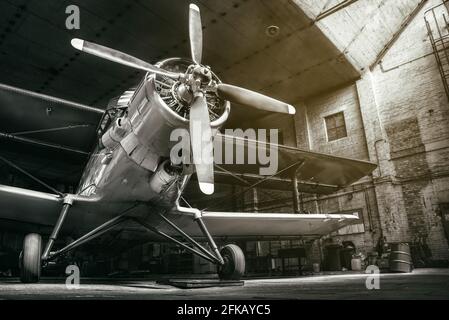 historical aircraft in a hangar Stock Photo