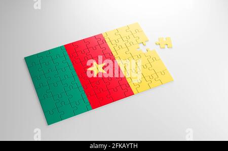 A jigsaw puzzle with a print of the flag of Cameroon, pieces of the puzzle isolated on white background. Fulfillment and perfection concept. Symbol Stock Photo