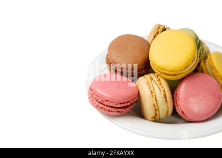 French dessert macaron isolated on white background. Modern Macarons on colorful background. Stock Photo