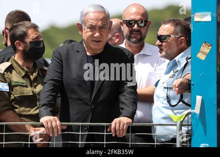 Mount Meron, Israel. 30th Apr, 2021. Israeli Prime Minister Benjamin Netanyahu visits the Jewish Orthodox pilgrimage site of Mount Meron, where dozens of worshippers were killed in a stampede during the Jewish religious festival of Lag Ba'Omer in northern Israel early on Friday. Credit: Ronen Zvulun/Reuters Pool /dpa/Alamy Live News