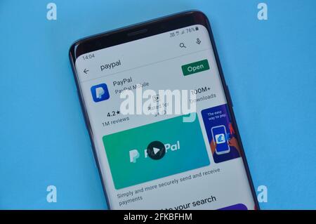 Google Pay app on Google Play Store website displayed on smartphone ...