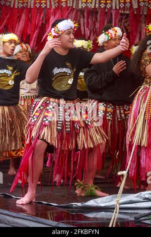 A costumed dancer from the island nation of Tuvalu performing at Pasifika Festival, a celebration of Pacific Island culture in Auckland, New Zealand