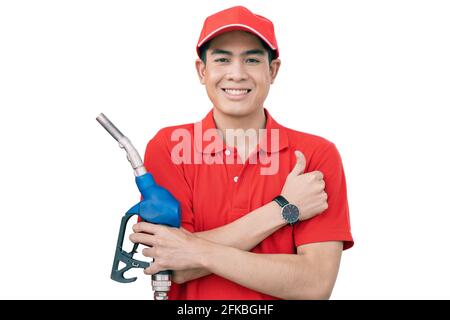 Gas station male man happy worker staff handle fuel nozzle and thumbs up isolated on white background with clipping path Stock Photo