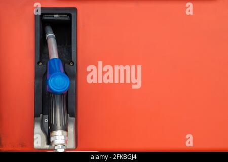 Fuel nozzle at Gas station dispensers or bowsers at for refill car engine gasoline with space for text Stock Photo