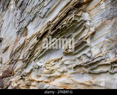 Wind erosion on sandstone cliff Stock Photo