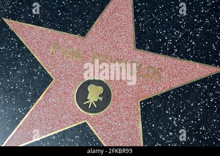 LOS ANGELES, CA, USA - MARCH 27, 2018 : The Hollywood Walk of Fame stars in Los Angeles. Ryan Reynolds star close up. Stock Photo