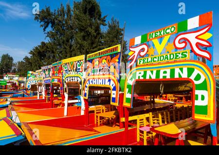 Colourful boats on the Aztec canal system, UNESCO World Heritage Site, Xochimilco, Mexico City, Mexico, North America Stock Photo