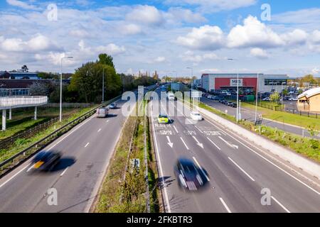 View from the Suspension footbridge over the A45 at Rushden Lakes shopping, Northampton, England, UK. Stock Photo