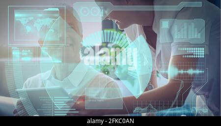 Composition of screen with data processing over business people using tablet Stock Photo
