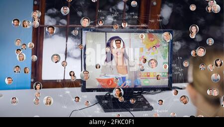 Composition of network of people's photographs over businesswoman on computer video call screen Stock Photo