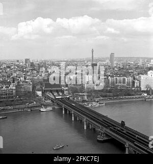 View of Hungerford Bridge from the Shell Centre, London UK - Taken in 1971 Stock Photo