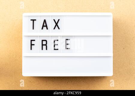 Light box with word tax free on wood background Stock Photo