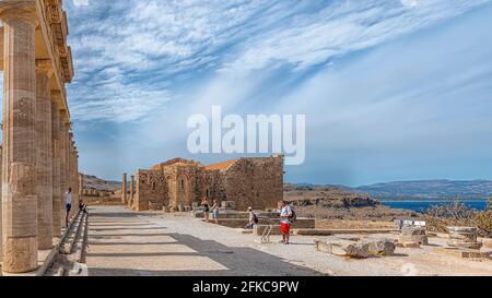 LINDOS, GREECE - OCTOBER 04, 2018: The ruined temple of Athena at the Lindos acropolis on the Greek island of Rhodes. Stock Photo