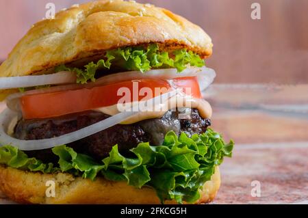 Home made barbecue cheese burgers in brioche bread buns Stock Photo