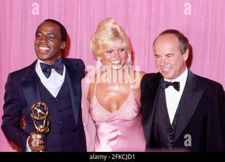 PASADENA, CA - SEPTEMBER 9: Loni Anderson, Robert Guillaume and Tim Conway  in the press room at The 31st Annual Primetime Emmy Awards on September 9, 1979 at the Pasadena Civic Auditorium, California Credit: Ralph Dominguez/MediaPunch Stock Photo