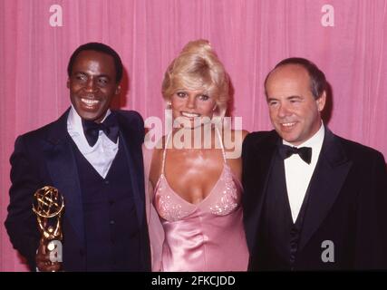 PASADENA, CA - SEPTEMBER 9: Loni Anderson, Robert Guillaume and Tim Conway  in the press room at The 31st Annual Primetime Emmy Awards on September 9, 1979 at the Pasadena Civic Auditorium, California Credit: Ralph Dominguez/MediaPunch Stock Photo