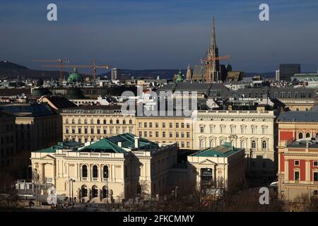 Panoramic view of Vienna (Austria) with St. Stephen's Cathedral, St. Peter's Church, Musikverein and Kunstlerhaus seen from the top of St. Charles Bor Stock Photo