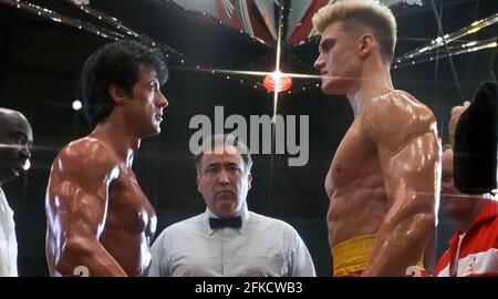 USA. Sylvester Stallone and Dolph Lundgren in a scene from (C)MGM/UA film: Rocky IV (1985). Plot: Rocky Balboa proudly holds the world heavyweight boxing championship, but a new challenger has stepped forward: Drago, a six-foot-four, 261-pound fighter who has the backing of the Soviet Union.  Ref:  LMK110-J7060-260421 Supplied by LMKMEDIA. Editorial Only. Landmark Media is not the copyright owner of these Film or TV stills but provides a service only for recognised Media outlets. pictures@lmkmedia.com
