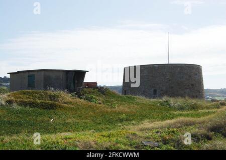 German bunker Jersey concrete gun battery second world war  post watch waiting attack military post Germany hill aerial stalk tower building Stock Photo