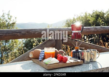 Stovetop espresso maker on camping stove, Fondo, Trentino, Italy Stock  Photo - Alamy