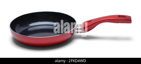 Red Empty Frying Pan Side View Cut Out. Stock Photo