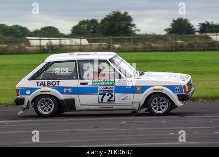 Richard Burns Memorial Rally 2009 at RAF Marham, Norfolk, UK, with a Talbot Sunbeam driven by Dave Welch Stock Photo