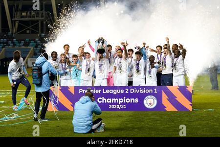 Manchester, England, 30th April 2021. Manchester City lift the U23 PL2 trophy during the Professional Development League match at the Academy Stadium, Manchester. Picture credit should read: Andrew Yates / Sportimage Credit: Sportimage/Alamy Live News Stock Photo