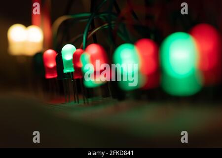 closeup of LED elements on electronic board in white green red Stock Photo