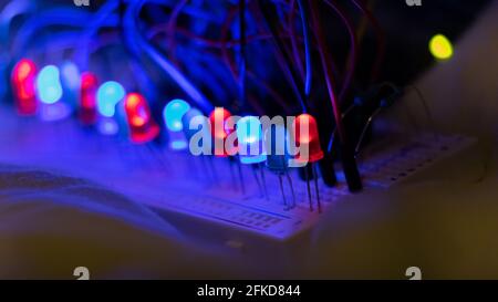 closeup of LED elements on electronic board in blue and red Stock Photo