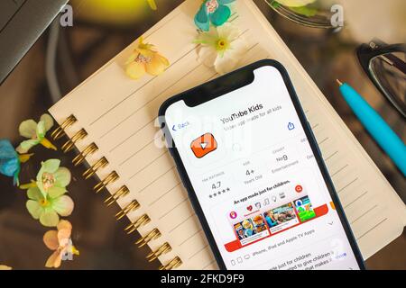 Kharkov, Ukraine - April 27, 2021: Youtube Kids app on the screen of Apple iPhone, application for watching online video for childs Stock Photo