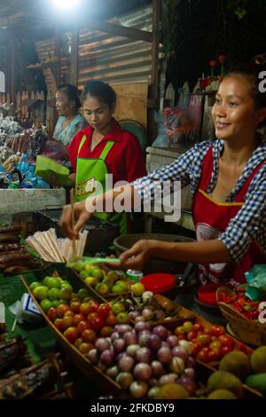 Luang Prabang, Laos - July 3, 2016:  Vendors at a night market. Stock Photo