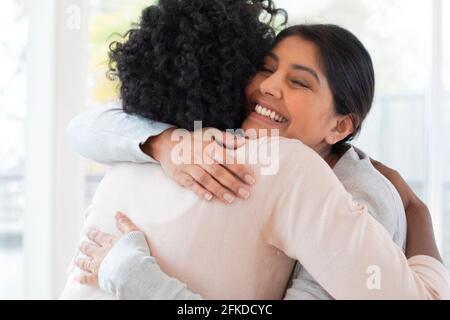 Friends hugging Stock Photo